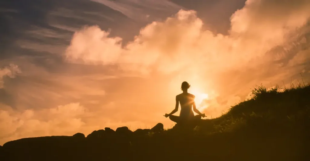 Silhouette meditating in nature, Liberated Thinking