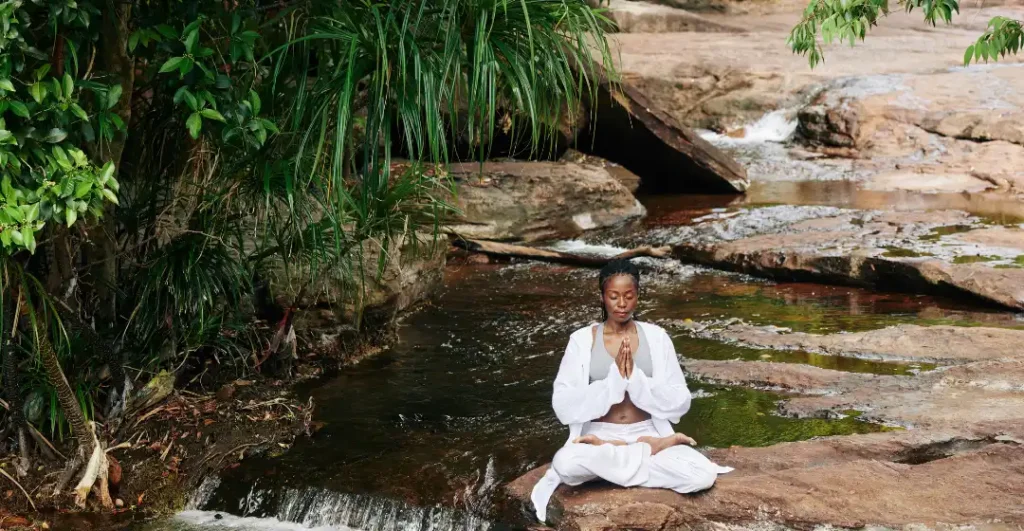 embodied alignment captured in serene natural setting